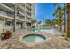 Outdoor pools and spa at a vacation condo complex with palm trees at 5511 N Ocean Blvd. # 902, Myrtle Beach, SC 29577