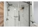 Modern bathroom featuring a marble shower with glass door at 5511 N Ocean Blvd. # 902, Myrtle Beach, SC 29577