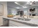 Modern kitchen featuring granite countertops, stainless steel appliances and an open concept to the living area at 640 Mccorkle Place, Conway, SC 29526