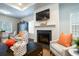 Living room features a fireplace with a TV and lots of natural light at 640 Mccorkle Place, Conway, SC 29526