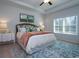 Comfortable main bedroom with neutral tones, a ceiling fan and plenty of natural light from the window at 640 Mccorkle Place, Conway, SC 29526