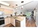 Bright kitchen with granite countertops, stainless steel appliances, and seamless flow into the cozy living room at 697 Tupelo Ln. # 24G, Longs, SC 29568