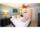 Relaxing main bedroom featuring a leaf-design ceiling fan, ambient lighting, and neutral decor at 697 Tupelo Ln. # 24G, Longs, SC 29568