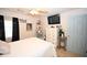 Charming main bedroom equipped with a ceiling fan, wall-mounted TV, and coordinating decor at 697 Tupelo Ln. # 24G, Longs, SC 29568