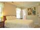 Comfortable bedroom with natural light and views of the backyard at 728 Tarpon Ct., Myrtle Beach, SC 29579