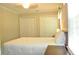 Well-lit bedroom featuring double closets and bright, neutral decor at 728 Tarpon Ct., Myrtle Beach, SC 29579
