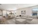Open concept living space with a kitchen, dining area, and comfortable seating, perfect for entertaining at 7469 Meadow Walk Loop, Loris, SC 29569