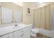 Well-lit bathroom featuring a tub and shower combination and single sink vanity at 817 S Ocean Blvd. # 201, North Myrtle Beach, SC 29582