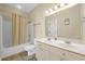 Bathroom featuring double sinks, tub/shower combo, and neutral color palette at 817 S Ocean Blvd. # 201, North Myrtle Beach, SC 29582