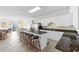 Gourmet kitchen featuring granite countertops, a large island, and modern stainless steel appliances at 817 S Ocean Blvd. # 201, North Myrtle Beach, SC 29582
