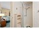 Bathroom featuring a step-in shower with seashell themed wallpaper at 9501 Shore Dr. # B-224, Myrtle Beach, SC 29572