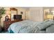 Comfortable main bedroom with dresser, television, and a serene ambiance at 9501 Shore Dr. # B-224, Myrtle Beach, SC 29572