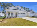 A charming single-story home featuring a well-manicured lawn and a two-car garage at 546 Beckham Ct., Murrells Inlet, SC 29576