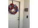 Front door with a patriotic wreath and address plaque at 510 Fairwood Lakes Dr. # 16M, Myrtle Beach, SC 29588