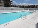 Community swimming pool with lounge chairs at 6305 N Ocean Blvd. # B-3, North Myrtle Beach, SC 29582