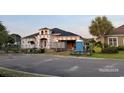 New construction home with lumber and construction materials shown in the driveway at 2115 Mirabel Ct., North Myrtle Beach, SC 29582