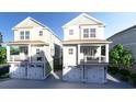 Two story homes with garage level entry and upper floor balcony at 201-B Madison Ct., Myrtle Beach, SC 29577