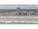 Aerial view showing building on beachfront with campers nearby, illustrating the property's proximity to the beach at 5905 S Kings Highway # 1117, Myrtle Beach, SC 29575