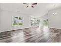 Open-concept living area with hardwood floors and a view of the kitchen at 85 Millsite Ct., Georgetown, SC 29440