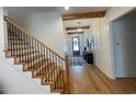 Modern staircase with black metal railing and light wood steps at 206 Green Lake Dr., Myrtle Beach, SC 29572