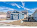 Side view of a detached two-car garage with an additional storage bay, set in a vibrant community at 8080 Laurel Ash Ave., Myrtle Beach, SC 29572