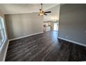 Spacious living room with hardwood floors, ceiling fan, and natural light at Tbd20 Privetts Rd., Conway, SC 29526