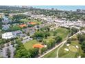 High angle view shows well-maintained recreation fields, commercial area, and condos near the beach at 1500 Cenith Dr. # F103, North Myrtle Beach, SC 29582