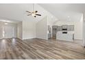 Spacious living room with hardwood floors and high ceilings at 1127 Cypress Shoal Dr., Conway, SC 29526