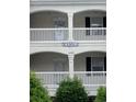 Building 8 exterior showing entrance and balconies at 1286 River Oak Dr. # 8-I, Myrtle Beach, SC 29579