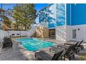 Backyard with a gorgeous in-ground pool, patio, and lounge chairs at 514 Vista Dr., Murrells Inlet, SC 29576