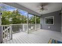 Covered porch area with scenic backyard views at 615 N 17Th Ave. N, Surfside Beach, SC 29575