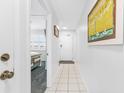 Hallway view of condo, showing access to bedroom and entry door at 2500 Ocean Blvd. N # 1014, North Myrtle Beach, SC 29582