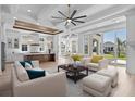 Open living area with hardwood floors, high ceilings and access to the backyard at 933 Bluffview Dr., Myrtle Beach, SC 29579