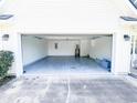 View of the large two car garage with freshly painted walls at 412 Callie Dr., Myrtle Beach, SC 29588