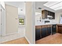 Kitchen with wood cabinets and white countertops at 6625 Scotsman Crescent, Myrtle Beach, SC 29588