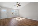 Spacious living room with hardwood floors and lots of natural light at 355 Barn Owl Way, Conway, SC 29527