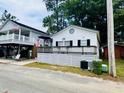 Lovely single-story beach house with a quaint front porch and classic design at 6001 - 1795 S Kings Hwy., Myrtle Beach, SC 29575
