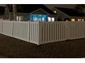 Backyard view with tall white fence and a screened in porch at 1266 Brighton Hill Ave., Myrtle Beach, SC 29588