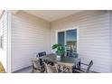 Outdoor patio with table and chairs at 149 Pampa Dr., Loris, SC 29569