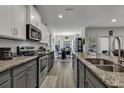 Stylish kitchen with granite countertops and modern appliances at 202 Rivers Edge Dr., Conway, SC 29526