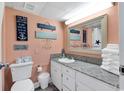 Bright bathroom with a modern vanity, decorative accents, and beach-themed decor for a relaxing vacation feel at 7000 Ocean Blvd. N # 133, Myrtle Beach, SC 29572