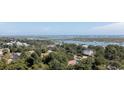 Wide aerial view showing neighborhood, marshland, and ocean in the distance at 590 Collins Ave., Murrells Inlet, SC 29576