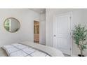 Serene bedroom with calming decor, view to entry hallway and natural light, perfect for relaxation and getting away at 206 Hadley Springs Ave, Longs, SC 29568