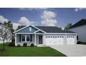 New construction home featuring a two-car garage and modern siding at 364 Mayflower Dr., Calabash, NC 28467