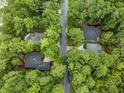 Aerial view of a house surrounded by lush trees and greenery at 1237 Clipper Rd., North Myrtle Beach, SC 29582