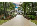 House nestled in a wooded area with a long driveway at 1237 Clipper Rd., North Myrtle Beach, SC 29582