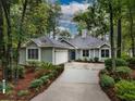 Charming single-story home with an attached garage and well-manicured landscaping at 1237 Clipper Rd., North Myrtle Beach, SC 29582
