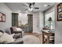 Home office with built-in green cabinets and wood desk at 1055 Academy Dr., Conway, SC 29526