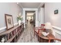 Long hallway with built-in shelving and seating area at 1926 Bluff Dr., Myrtle Beach, SC 29577