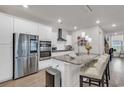 Modern kitchen with stainless steel appliances and granite island at 2020 Santa Maria St., Myrtle Beach, SC 29579